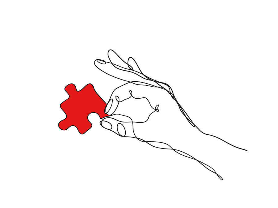 Eine gezeichnete Hand hält ein rotes Puzzlestück